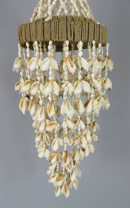 Product Import Holland - Shell pendant - Piercing Abaca